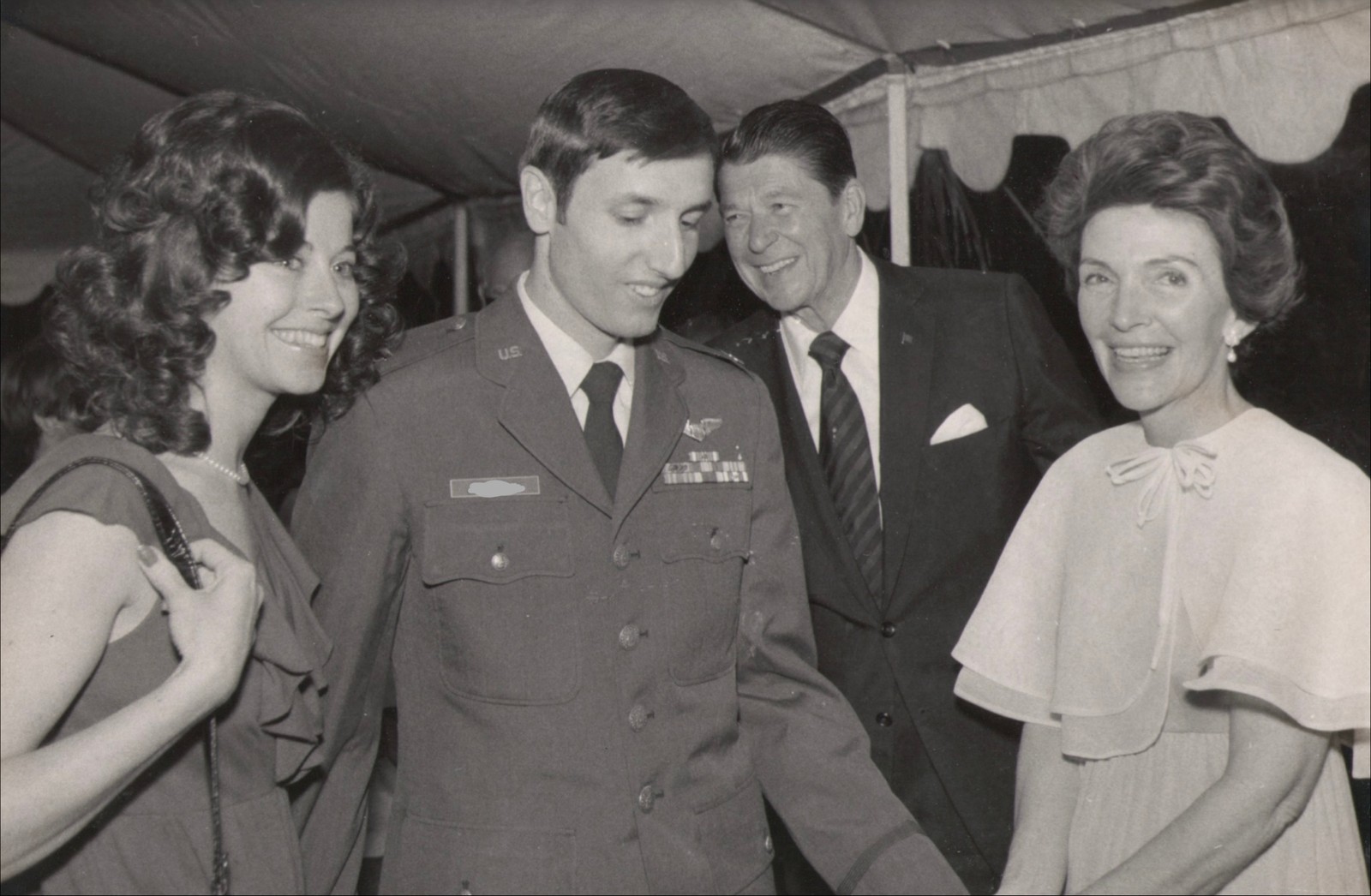 Air Force captain and wife meeting Ronald and Nancy Reagan