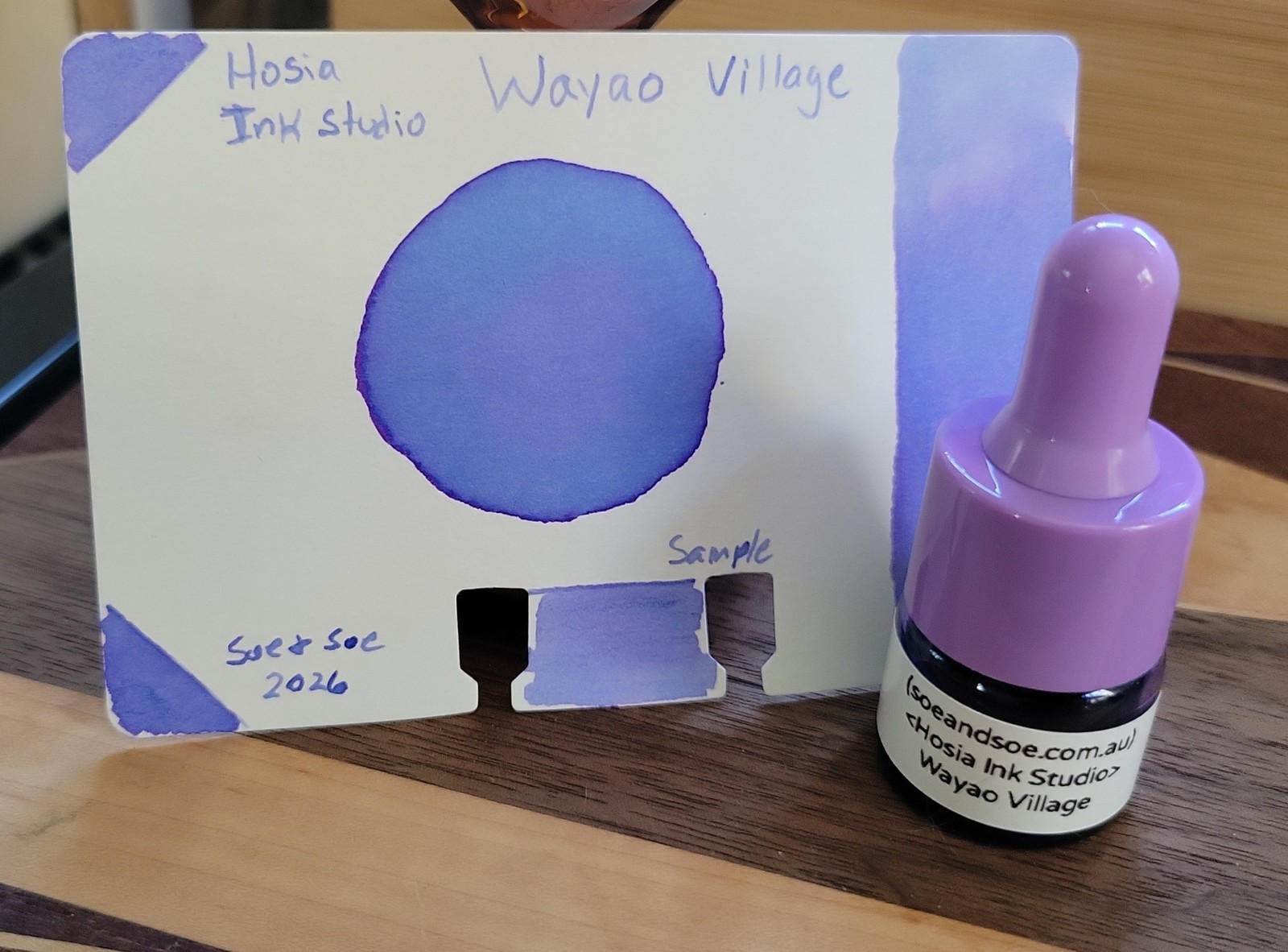 Sample bottle and ink swatch